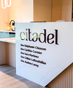 kid trying on glasses